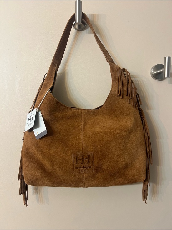 Haute Hippie Handbags - Haute Hippie brown suede hobo bag featuring long fringe detailing on the sides.